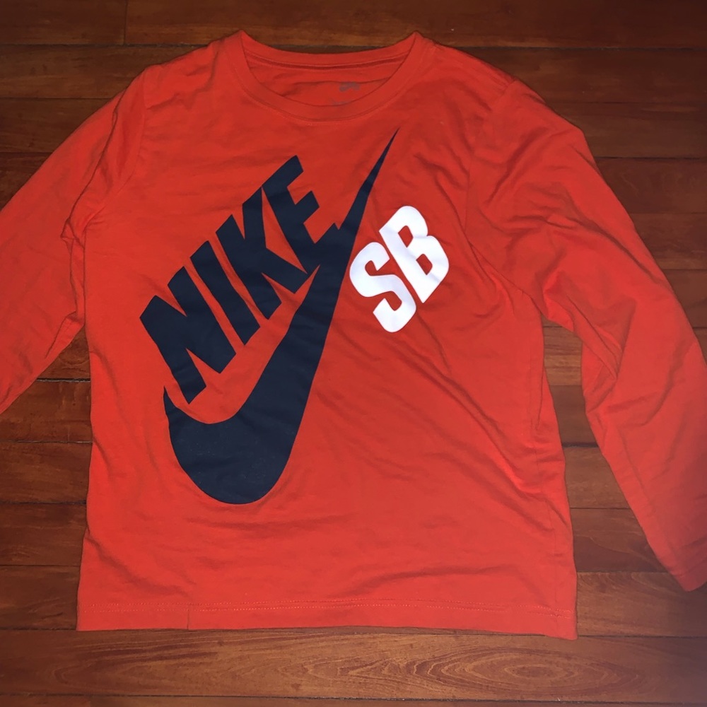 Orange Nike shirt